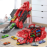 T-Rex Transportator cu 4 Mașinuțe Metalice – Dinozaur Transformabil (culoare aleatorie)  