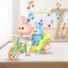 Iepurașii Veseli pe Tricicletă cu Lumină și Muzică (culoare aleatorie)