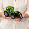 Tractor de jucărie cu inerție și braț mobil
