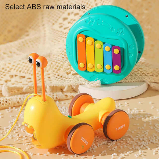 Melcul Multifuncțional 3-în-1 cu Xilofon și Catapultă (culoare aleatorie)