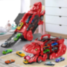 T-Rex Transportator cu 4 Mașinuțe Metalice – Dinozaur Transformabil (culoare aleatorie)