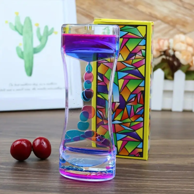 Clepsidră Lichidă Antistres cu Picături Colorate (culoare aleatorie)