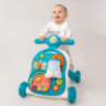Premergător 4-în-1 pentru Bebeluși | Masă de Joacă, Vehicul și Activități Muzicale 