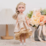 Păpușă Blondă Sennby Baby în Rochie Aurie Elegantă – 35 cm